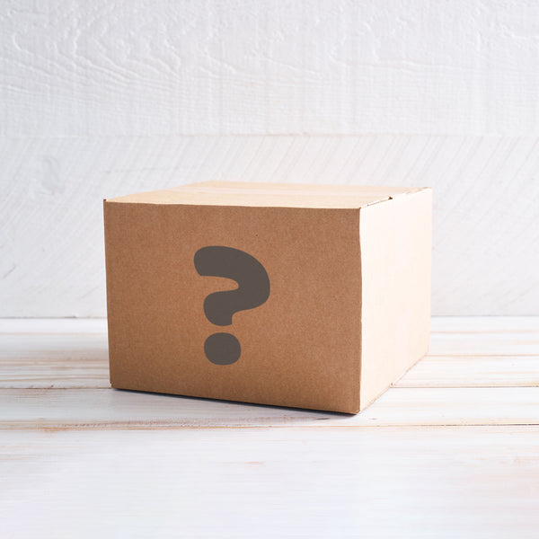Cardboard box with a question mark on it.