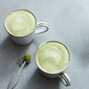 Two prepared cups of teapigs premium organic matcha