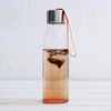 peach eva solo water bottle filled with tea
