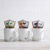 teapigs branded mugs with select piglet packs inside 